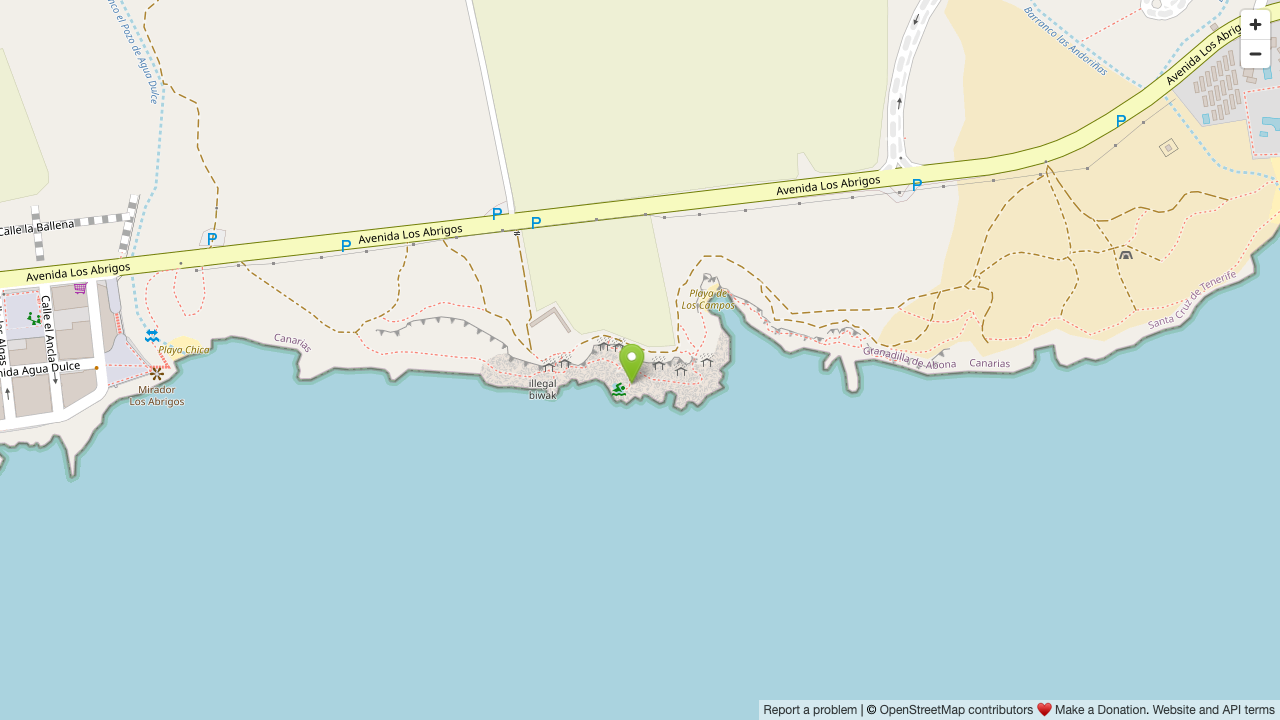 Map view centered on the Los Abrigos natural pools and east-edge access road.