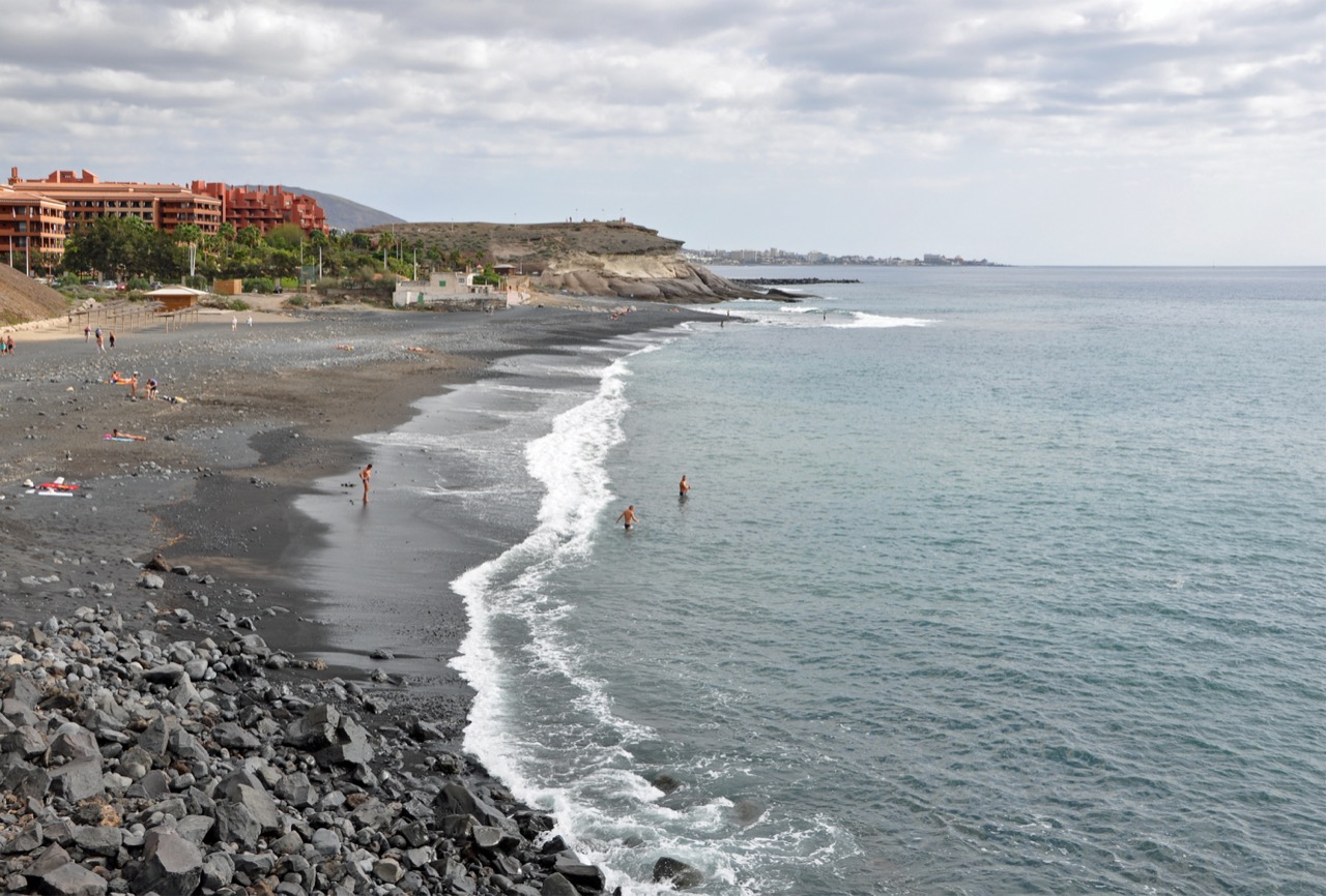 View of Playa de La Enramada with mixed stone-and-sand beach and Costa Adeje coastline.