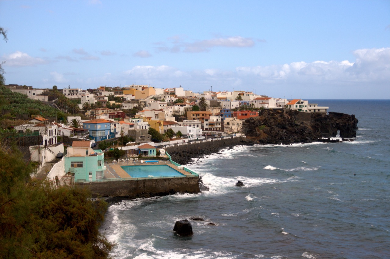 Rocky Las Aguas coastline and pebble beach in San Juan de la Rambla.