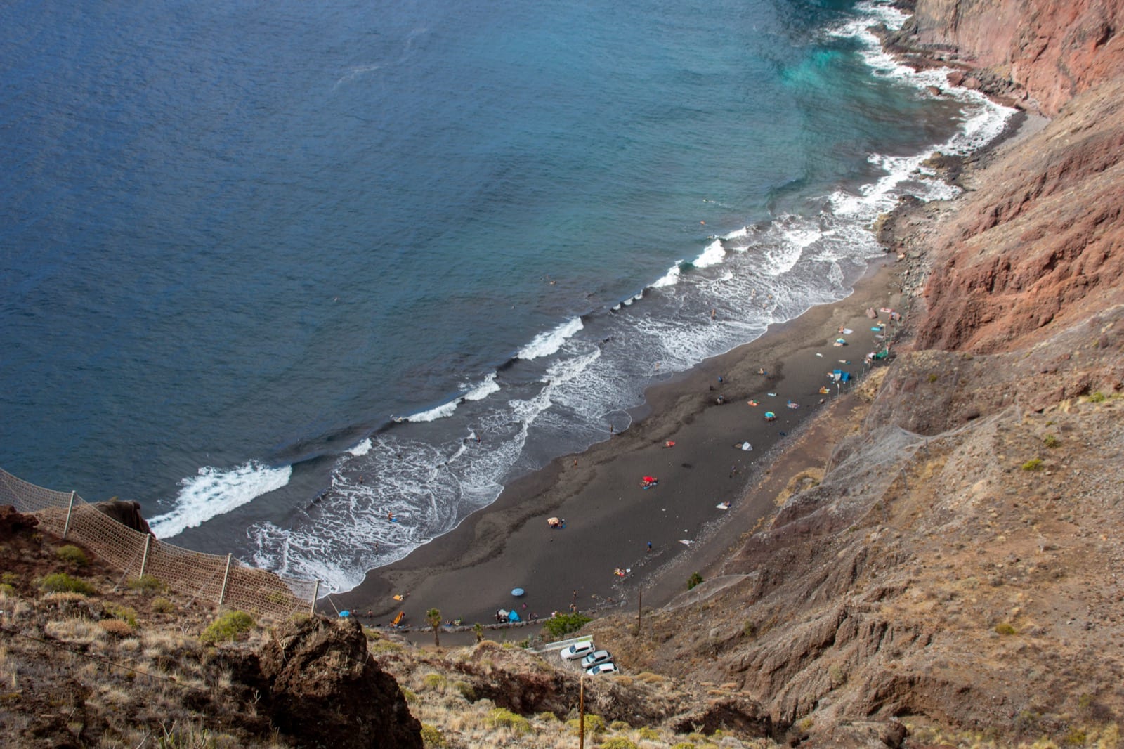 View from above over the black-sand beach of Playa de Las Gaviotas below the Anaga cliffs.