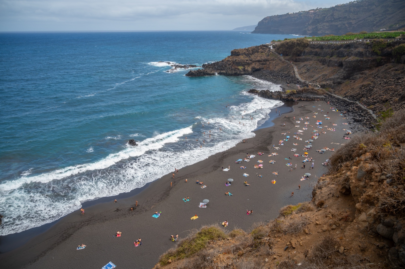 Black-sand Playa de El Bollullo below the cliffs of El Rincon in La Orotava.