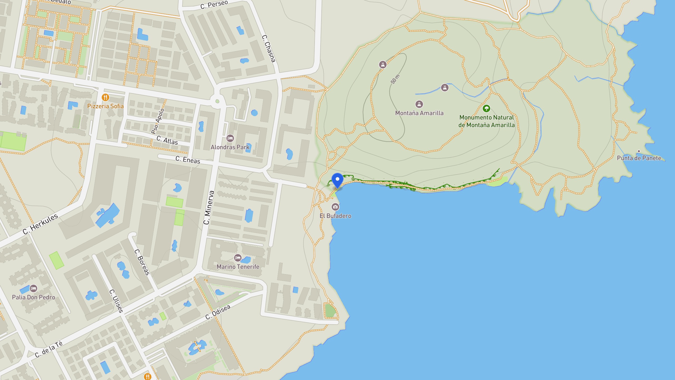 Map view of Playa Montaña Amarilla, the coastal access streets, and the volcanic headland.