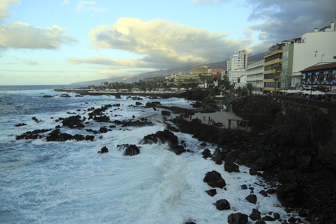 Rocky Playa de San Telmo bathing area beside the Puerto de la Cruz promenade.